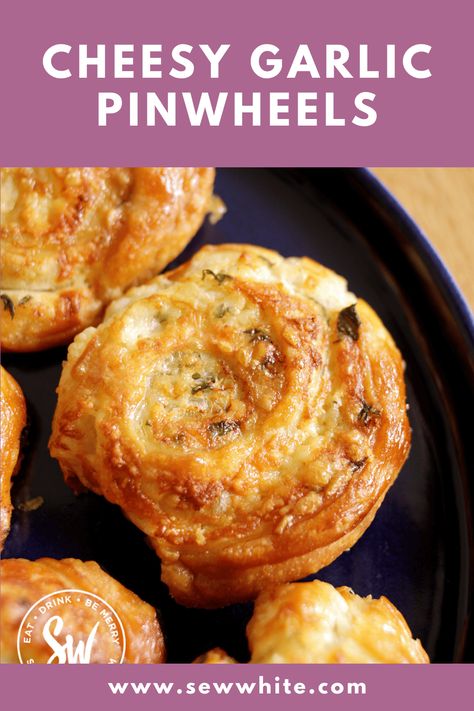 This cheesy garlic pinwheels recipe packs a serious punch of garlic flavour that will satisfy even the most die-hard garlic fan. The garlic and herb butter is smeared over the puff pastry and topped with grated cheese before rolling. This is a recipe for all garlic lovers! Cheese Pinwheels Puff Pastries, Puff Pastry Cheese Rolls, Pinwheel Appetizers Puff Pastry, Puff Pastry Recipes Savory Pinwheels, Puff Pastry Pinwheel Recipes, Puff Pastry Garlic Bread, Savoury Pinwheels, Pastry Sheet Recipes, Garlic Pinwheels