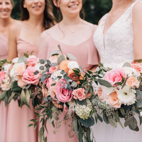 The Florist at Mandy's Spring designed these wedding flowers using a soft pink palette. Pastel pink and coral roses are set off by white Gerber daisies, hydrangeas, and sage green eucalyptus.

Photos by Ellen Sargent Sage Green And Coral Pink Wedding, Sage Green Flowers, Sage Dress, Coral Roses, Boho Inspiration, Pink Palette, Pink And White Flowers, Coral Wedding, Pink Wedding Flowers