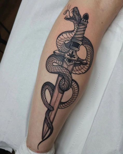 Work by @kerrynellantattoo ▪️Snake and Dagger I got to do today, thanks so much Alex for making the journey!🖤 . . . . #blackworktattoo #blackwork #blackworknow #lineworktattoo #lancaster #stippletattoo #dotworkers #Snake #Dagger #tattoo #tattoodesign #tattooartist #ink #illustrativetattoos #killerink #starrtattoosupplies #stippling #art #artistsoninstagram Snake And Dagger Tattoo, Tattoo Apprenticeship, Dagger Tattoo, Rose Tattoo Design, Line Work Tattoo, Snake Tattoo, Foot Tattoo, Tattoo Placement, Blackwork Tattoo