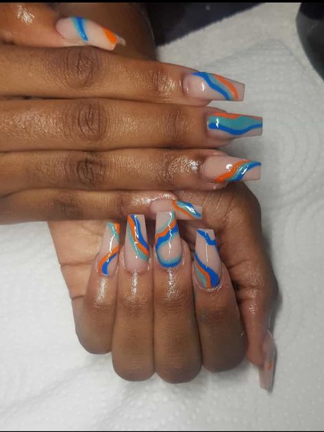 Orange Green And Blue Nails, Teal And Burnt Orange Nails, Dark Teal Blue Nails, Blue Green Orange Nails, Orange And Blue Acrylic Nails Designs, Dark Blue And Orange Nails, Blue And Orange Swirl Nails, Orange And Blue Nails Design, Orange And Teal Nails