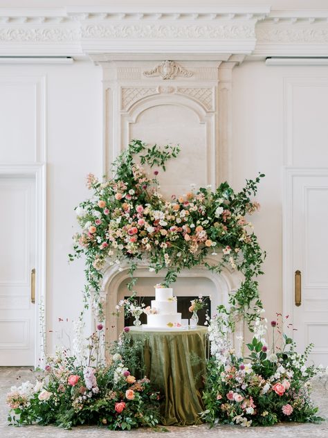 Elaborate Wedding Florals, Wedding Cake Table Floral Arrangements, Flower Cakes Wedding, Indian Wedding Florals, Fireplace Floral Arrangements, Mantle Installation, Wedding Cake Backdrop Ideas, Wedding Cake Display Ideas, Flower Fireplace