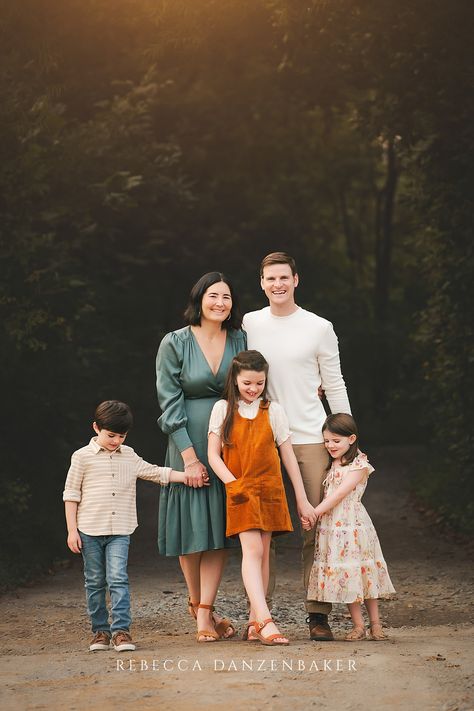 Burnt orange, teal, cream and khaki were a complete win for these family photos! Rebecca Danzenbaker Photography #familyphotography #whattowear #familywardrobe #fallfamilyoutfits #photosessionoutfits #familyphotooutfits Family Pictures With Burnt Orange, Family Photos Thanksgiving, Fall Photoshoot Outfits Family Teal, Teal Family Photo Outfits, Burnt Orange And Olive Family Pictures, Orange Dress Fall Family Photos, Teal Family Pictures Outfits Fall, Fall Family Pics Burnt Orange, Teal And Rust Family Photos