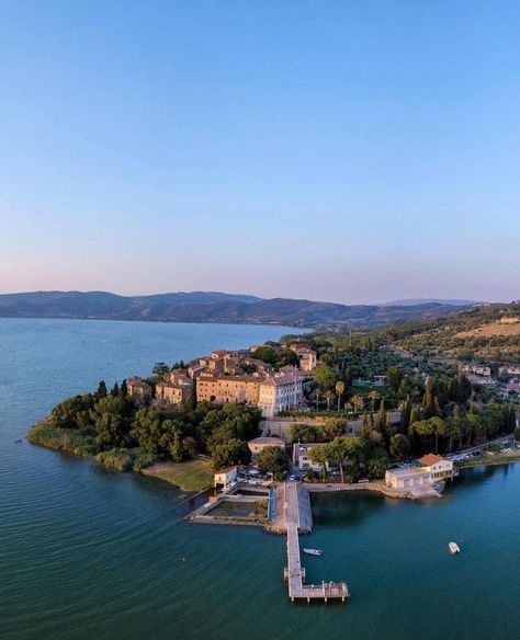 Monte del Lago, in Umbria region, is a place to visit when walking calmly, savouring the silence that is only broken by the quiet daily life within the ancient walls of this quaint hamlet on Lake Trasimeno. Monte del Lago is in the province of Perugia and is located on a promontory close to the Lake. Place To Visit, The Quiet, Umbria, Daily Life, Places To Visit, Walking, Lake, Italy, Water