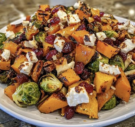 ￼ 🍂 Cranberry-Glazed Roasted Butternut Squash, Brussels Sprouts, and Sweet Potato Salad with Cranberries and Goat Cheese 🧀  This fall-inspired salad brings together roasted butternut squash, Brussels sprouts, and sweet potatoes, topped with tangy cranberry glaze, creamy goat cheese, and extra cranberries for a delicious balance of sweet and savory flavors.  Ingredients:  For the Roasted Vegetables: 1 small butternut squash, peeled and cubed 1 lb Brussels sprouts, trimmed and halved 2 medium sweet potatoes, peeled and cubed 3 tablespoons olive oil Salt and pepper, to taste 1 teaspoon dried thyme  For the Cranberry Glaze: 1/2 cup cranberry juice 1/4 cup dried cranberries 2 tablespoons honey or maple syrup 1 tablespoon balsamic vinegar  For the Finishing Touch: 4 oz goat cheese, crumbled 1/ Brussel Sprouts Cranberries, Salad With Cranberries, Sprouting Sweet Potatoes, Butternut Squash Sweet, Roasted Vegetable Salad, Sweet Potato Salad, Goat Cheese Recipes, Squash Salad, Vegetable Medley