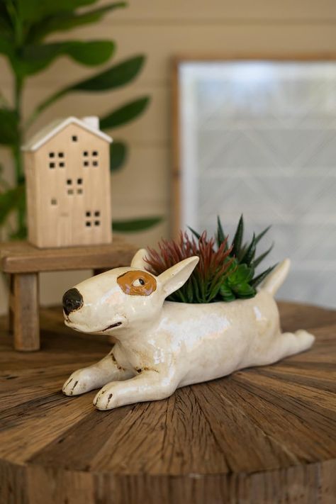 PRICES MAY VARY. Color: MULTI Finish: GLAZED Material: CERAMIC KALALOU CDV2264 CERAMIC BULL TERRIER PLANTER. Color: MULTI. Finish: GLAZED. Material: CERAMIC. Dimension(in): 12.5(L) x 4(W) x 5.5(H). 3 drain holes. Care Instructions: Wipe with lint free cloth. Dog Pottery, Pottery Animals, Dachshund Gifts, Pinch Pots, Clay Animals, Ceramic Animals, Succulent Garden, Ceramic Pots, Ceramics Ideas Pottery