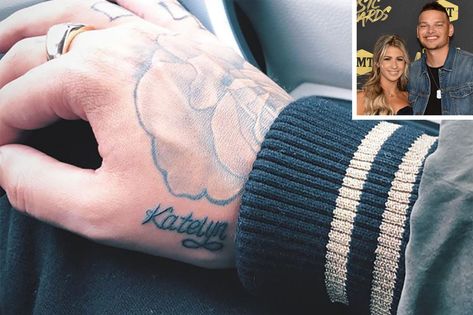 Kane Brown Tattoos His New Wife Katelyn's Name on His Hand After Saying 'I Do' Wifes Name Tattoo Ideas For Men, Wife Name Tattoo, Brown Tattoos, Tattoos On Hand, Name Tattoo On Hand, Symbol For Family Tattoo, Wedding Dress Details, Mother Son Tattoos, Brown Instagram