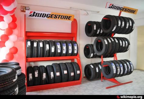 Tire Shop Decor Ideas, Tyre Shop Design, Shop Bathroom Ideas, Garage Design Interior, Tire Storage, Tire Shop, Bridgestone Tires, Mobile Car Wash, Commercial Design Exterior