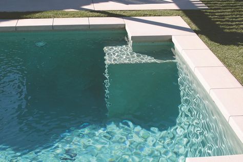 Soft-green colour at the waterline matched with the soft green plaster, effectively blending them together and making the waterline disappear. Pool Waterline Tile Ideas, Pool Conservatory, White Waterline, Pool Waterline Tile, Tiled Pool, Pool Waterline, Waterline Pool Tile, Waterline Tile, Pool Tile Designs