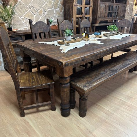 The Legendary all time best selling Ponderosa Dining Set Now in 8' length. 100% Solid Wood Construction, this table is build to last! Finished in a dark wax stain and accented with metal nail heads, The Ponderosa 8' will be a perfect fit for those looking for a large table set in a timeless rustic style. Choose from all 8 chairs or 5 chairs and a bench! Western Living Room, Rustic Kitchen Tables, Western Furniture, Rustic Dining Room, Table Sets, Farmhouse Dining Room, Rustic Table, Farmhouse Dining, Farmhouse Table