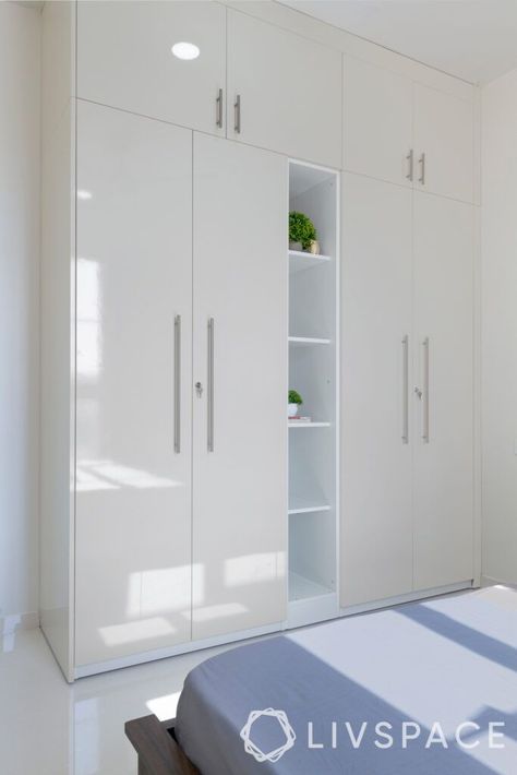 guest-bedroom-laminate-wardrobe-lofts-shelves Almari Design Bedroom, Room Wardrobe Design, Hype Beast Bedroom, Modern Bedroom Wardrobe, Wardrobe Laminate Design, Compact Kitchen Design, Hype Beast, Bedroom Cupboard, Closet Design Layout