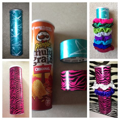 Scrunchie Holder!  Made from empty Pringles can and fun decorative duct tape!  Large scrunchies stretch easily around can and smaller ones can be stored inside can! I have struggled for years with trying to find a good way to store these.  This is so simple!! Scrunchie Holder Ideas, Scrunchie Holder Diy, Storing Scrunchies, Diy Scrunchie Holder, Scrunchy Holder, Scrunchie Storage, Duct Tape Diy, Scrunchie Holder, Large Scrunchies