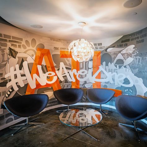 An interior office mural idea painted in Atlanta, Georgia.  Utilizing a monotone background and highlight pop colors to create a graffiti art wall that works well with a clean design aesthetic.  We can hand paint murals with spray paint and brush.  Visit our website for tons of additional examples and contact us for mural ideas 646-801-6024 Office Graffiti, Office Murals, Mural Cafe, Exterior Murals, Office Mural, Interior Murals, Curved Wall, Best Graffiti, Paintings Wall