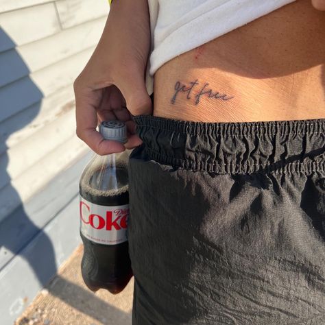 lana del rey “get free” hip tattoo Into The Blue Tattoo Lana, Tattoos Inspired By Lana Del Rey, Hip Tattoo Small Men, Ldr Inspired Tattoos, Small Lana Del Rey Tattoo, Out Of The Black Into The Blue Tattoo Lana, Lana Del Ray Inspired Tattoos, Get Free Lana Del Rey Tattoo, Lana Del Rey Tattoos Ideas