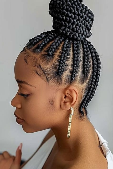 The perfect updo! This high bun with intricate cornrows is ideal for formal events or just adding a touch of elegance to your everyday style. Cornrow Updo Hairstyles Buns, Updo Cornrow Hairstyles, Cornrows Into A Bun, Intricate Cornrows, Updo Cornrows, Braided Bun Updo, Two Goddess Braids, Goddess Cornrows, Vacay Hair