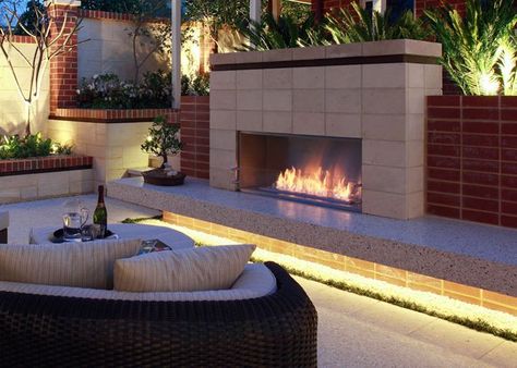 Like the fireplace and lighting under the hearth. Great for small patio space Contemporary Outdoor Fireplaces, Ventless Gas Fireplace, Zero Clearance Fireplace, Design Camino, Ventless Fireplace, Backyard Fireplace, Outdoor Fireplaces, Concrete Fireplace, Bioethanol Fireplace