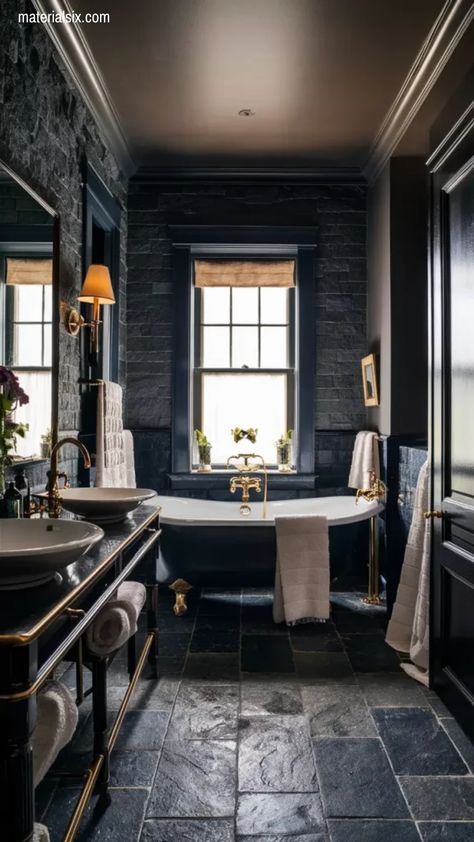 Luxurious bathroom with dark stone walls, freestanding bathtub, and large window. Victorian Tiles Bathroom, Academia Bathroom, Dark Academia Bathroom, Victorian Bathroom Accessories, Dark Academia Interior, Gothic Bathroom, Bathroom Color Schemes, Victorian Bathroom, Bathroom Color