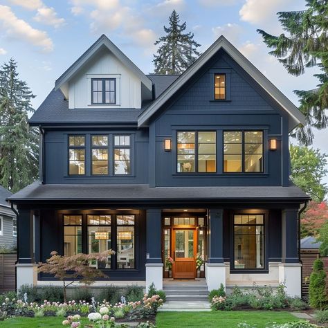 Dark Blue House Exterior Black Windows, Norwegian Homes Exterior, Dark Blue Siding, Dark Blue Vertical Siding, Dark Blue Siding House With Stone, Colonial Style Home Exterior, Black Exterior Lake House, Daek Blue House With Farm Lights, New England Home Exterior