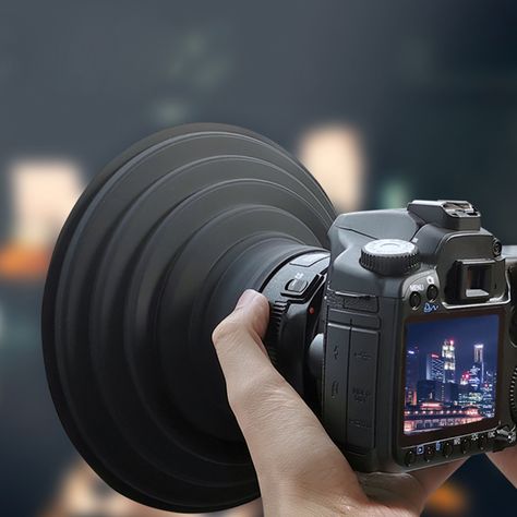 Feature:Take mirror-free photos, videos and timelapse through slices. That and more. For photographers filmmakers.The Lens Hood is an incredibly versatile, collapsible, high quality silicone cone that attaches to any camera or lens.Gone are the days when photographing through glass panes creates annoying reflections and reflections, which then have to be effortlessly removed in Photoshop. Whether you're shooting through a hotel window, a skyscraper observation deck, the window of a bus or a zoo Fuji Camera, Hood Cover, Dslr Photography Tips, Pocket Camera, High Building, Bad Photos, Smartphone Accessories, Lens Hood, Camera Equipment