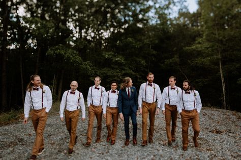 These groomsmen wore khaki pants, white button-ups, and red accessories for this Virginia wedding | Image by Earthmark Photography Groomsmen Khaki Pants Suspenders, Khaki Pants With Suspenders Wedding, Dark Khaki Groomsmen Attire, Navy Blue And Khaki Wedding, Groomsman Khaki Pants, Groomsmen In Khaki Pants, Navy And Khaki Groomsmen, Navy And Khaki Wedding, Groomsmen Attire Khaki Pants