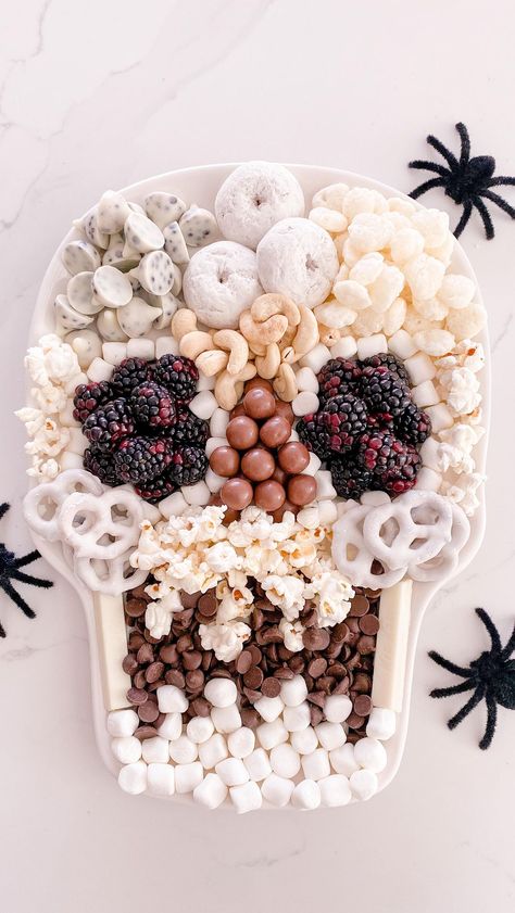 Easy Skull Treats Tray! @target . This ceramic skull serving platter is so convenient to use! Use the eyes, nose, and mouth as a guide and… | Instagram Skull Snack Board, Halloween Skull Charcuterie Board, Easy Halloween Board, Skull Charcuterie Board, Halloween Snack Tray, Charcuterie Vegan, Halloween Hosting, Charcuterie Trays, Halloween Platter