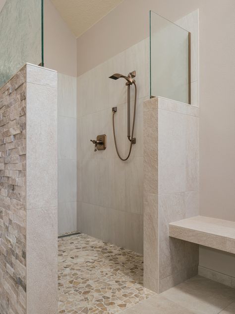 Walk In Spa Shower Master Bath, Walk In Shower With Stone Floor, Walk In Shower No Door Half Walls, Large Curbless Shower Ideas, Shower Glass Panel Half Walls, Shower With No Walls, Cave Shower Ideas, Walk In Shower Pebble Floor, Earthy Stone Bathroom