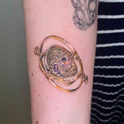 Time turner tattoo #tattoo #harrypotter #harrypottertattoo #tattooideas #tattooartist #tattooart #tattoosforwomen #colortattoo #microrealism #realismtattoo Harry Potter Time Turner, Harry Potter Time Turner Tattoo, Time Turner Tattoo, Korean Tattoo Artist, Time Turner, Hp Tattoo, Harry Potter Tattoo, Harry Potter Tattoos, Phoenix Tattoo