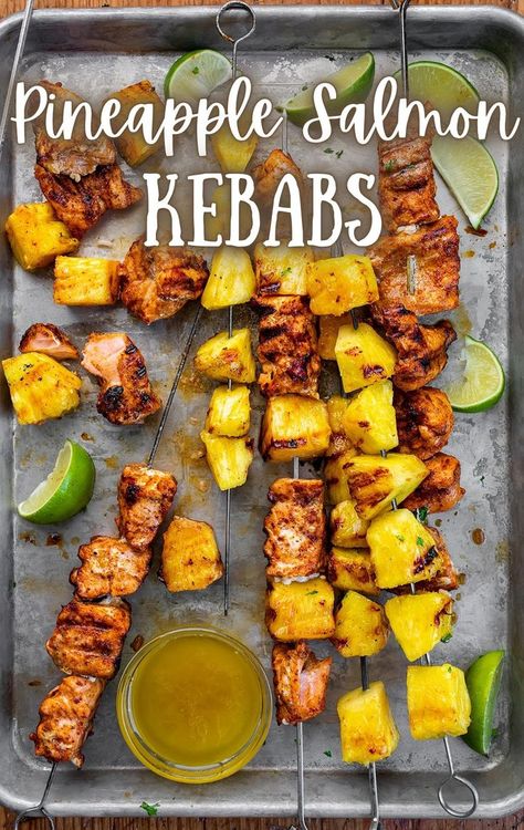 Overhead image of multiple skewers filled with grilled salmon and pineapple chunks, with lime wedges placed around the skewers. Cubed Salmon, Grilled Skewer Recipes, Salmon Appetizer Recipes, Pineapple Salmon, Recipes Pineapple, Salmon Skewers, Salmon Filets, Grilled Recipes, Bbq Salmon