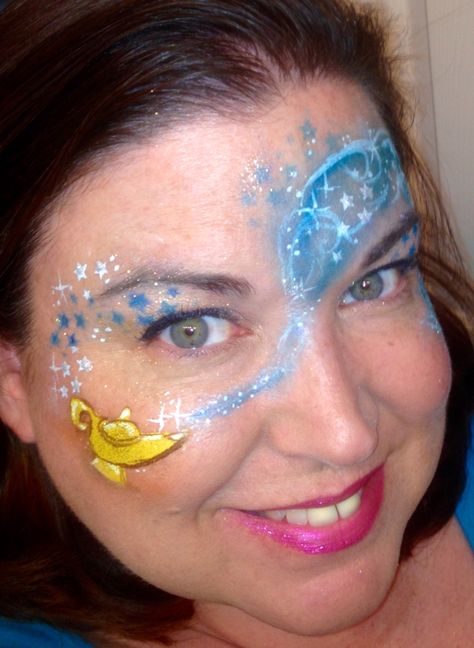 Aladdin lamp genie face paint by Amanda Nelson of Amazing Face by Amanda Nelson Orlando FL Aladdin Face Paint, Jasmine Face Paint, Genie Face Paint, Disney Character Face Paint, Disney Halloween Makeup, Disney Face Painting, Princess Face Painting, Eye Face Painting, Witch Eyes