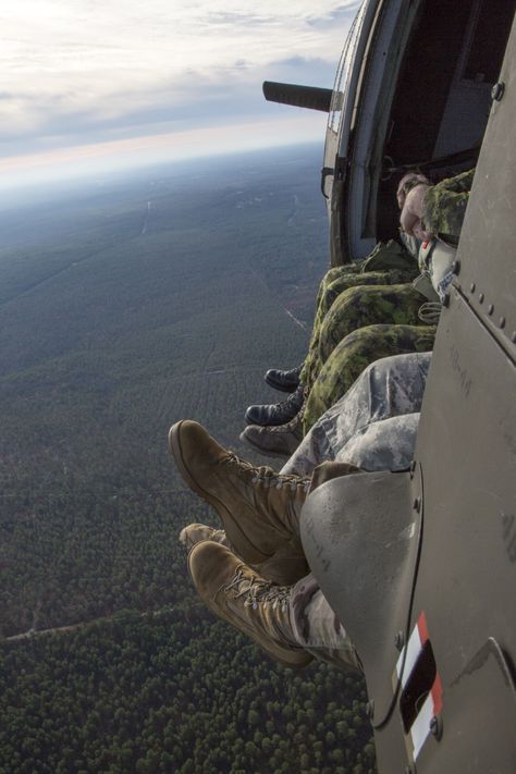 U.S. and Canadian paratroopers sit in a UH-60 Black Hawk for airborne operations in support of Operation Toy Drop, Fort Bragg, N.C., Dec. 3, 2015. Operation Toy Drop combines U.S. Army Reserve personnel, Army paratroopers, dozens of volunteers and partner nation military personnel, more than a dozen Air Force aircraft and toys, all for what has become the world’s largest combined airborne operation. (U.S. Army photo by Spc. Tracy McKithern/Released) Air Force Reserve Women, Air Force Army Aesthetic, U.s. Air Force Women, Paratrooper Aesthetic, Army Rotc Aesthetic, Air Cadets Uk, Royal Air Force Aesthetic, Usafa Aesthetic, Airforce Boots