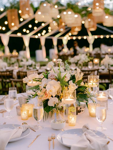 Tented wedding reception tablescape ideas for tropical wedding with hanging baskets and greenery over dancefloor at the Islander Resort in the Florida Keys. Island Wedding Table Decor, Tommy Bahama Wedding, Tropical Beach Wedding Decorations, Wedding Colors Tropical, Florida Wedding Aesthetic, Beach Tropical Wedding, White Tropical Wedding Flowers, Catalina Island Wedding, Florida Wedding Theme