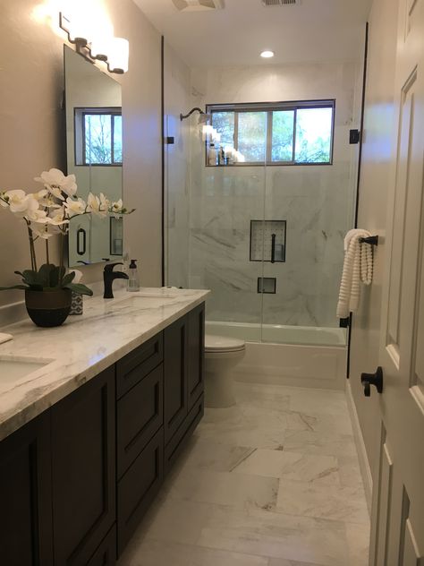 Bathroom remodel. Simple Elegance. White Calcutta umber. schluter. Black Countertops Bathroom Color Schemes, Simple Elegant Bathroom Ideas, Bathroom Remodel Simple, White Granite Bathroom, Normal Bathroom, Guess Bathroom, Mens Bathroom Decor, Cheap Bathroom Remodel, Bathrooms Ideas