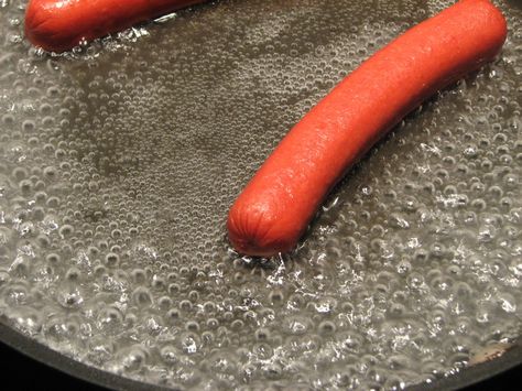 The Proper Way to Cook a Hot Dog? | The Paupered Chef Boiling Hot Dogs, How To Boil Hot Dogs On Stove, Steaming Hot Dogs, Skillet Hot Dogs, Boiled Hot Dogs Recipes, Hot Dogs On Stove Top, Ways To Cook Hot Dogs, Steam Hot Dogs, Best Way To Make Hot Dogs