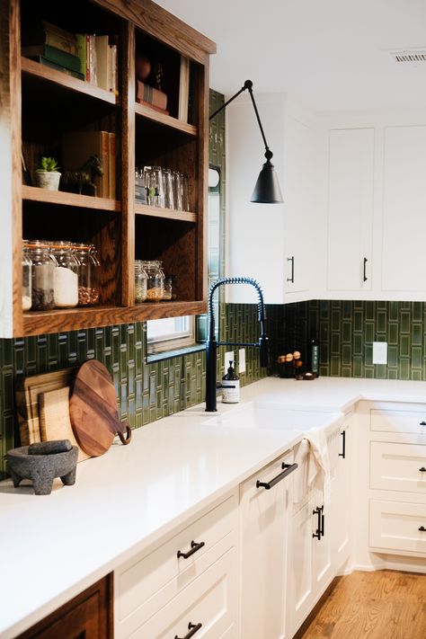 This modern farmhouse kitchen at our Summer Lane project was transformed by this high-gloss green subway tile. The vibrant hues, organic elements, and bespoke furnishings seamlessly blend indoor and outdoor spaces, crafting a haven for creativity, relaxation, and authentic living. Green Tile Kitchen White Cabinets, Modern Desert Kitchen, Green Subway Tile Kitchen, Green Tile Kitchen, Kitchen Shaker Cabinets, Green Tile Backsplash, Organic Modern Kitchen, Green Subway Tile, Eclectic Tile