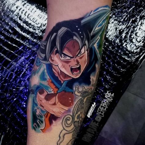 Goku Ultra Instinct from Dragon Ball Super tattoo done by Portland Anime Tattoo Artist Ryan Burke.  Tattoo was done at Necropolis Tattoo. Goku Ultra Instinct Tattoo, Ultra Instinct Tattoo, Dragon Ball Super Tattoo, Instinct Tattoo, Anime Tattoo Artist, Ryan Burke, Goku Tattoo, Ultra Instinct Goku, Super Tattoo