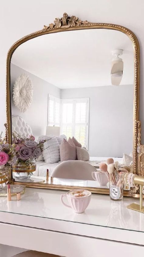 To help you organize your vanity, we've rounded up 14 beautiful vanities with inspiring storage solutions. It's easy to make your getting-ready space shine in just a few simple steps. #Vanity #VanityIdeas #VanityDecor #TheSpruce Dresser Into Makeup Vanity, Mirror In Front Of Window Bedroom, Teen Room With Vanity, Teen Vanity Ideas Bedroom, Cute Preppy Room Ideas, Aesthetic Vanity Organization, Vanity Decor Ideas Bedroom, Vanity Decor Aesthetic, Vanity Inspo Aesthetic