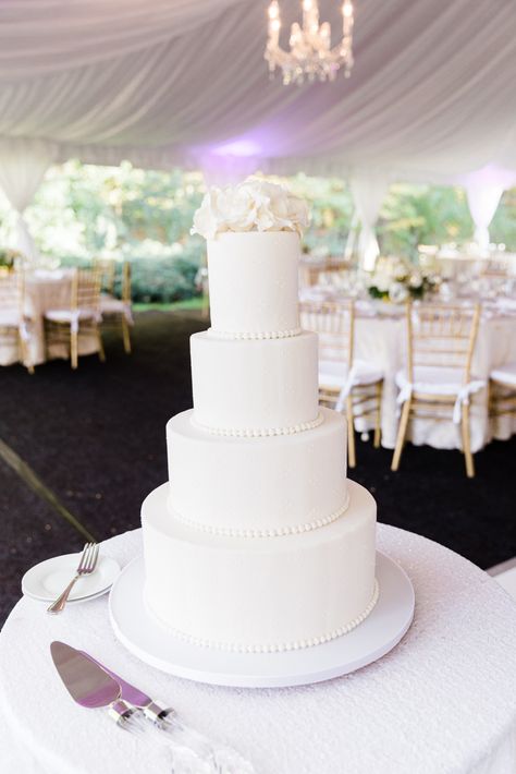 Simple White Tiered Cake, Plain White 3 Tier Wedding Cake, Simple Elegant 4 Tier Wedding Cake, 4 Tier Pearl Wedding Cake, White Roses On Wedding Cake, 3 Layer Wedding Cake Elegant, Wedding Cake 4 Layers, Tall White Wedding Cake, Solid White Wedding Cake