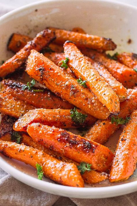 Roasted Garlic Parmesan Carrots - An easy, family favorite roasted carrots recipe tossed with the most flavorful garlicky and buttery parmesan cheese coating. The carrots come out sweet, tender and really delicious. #carrotssidedish #easter #cheese Garlic Parmesan Carrots, Parmesan Roasted Carrots, Parmesan Carrots, Garlic Carrots, Carrots Side Dish, Roasted Carrots Recipe, Carrots Recipe, Roasted Vegetable Recipes, Cooked Carrots