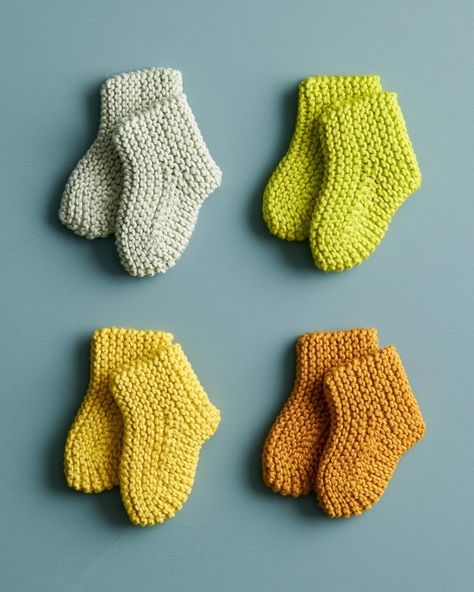 Happy Feet Booties - Purl Soho | Beautiful Yarn For Beautiful KnittingPurl Soho | Beautiful Yarn For Beautiful Knitting Knit Baby Booties Pattern Free, Baby Socks Knitting Pattern, Baby Booties Free Pattern, Baby Bootie, Baby Booties Knitting Pattern, Knitting Dolls Clothes, Creative Knitting, Knit Baby Booties, Handmade Baby Gifts