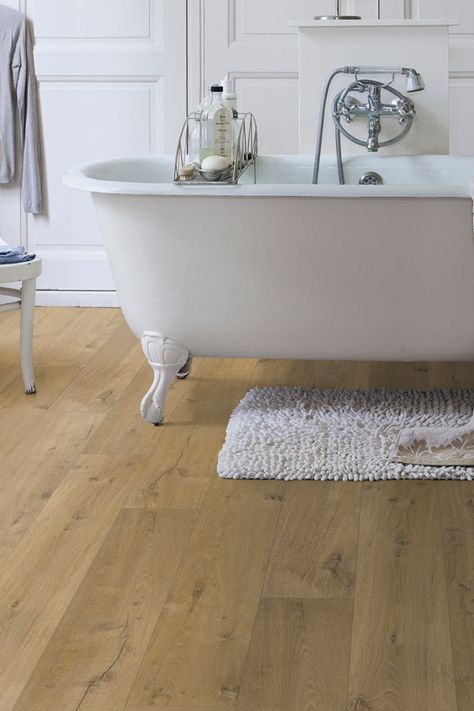 Upgrade your bathroom with Quick-Step Impressive Ultra, the first waterproof laminate flooring. Featuring stunning, true-to-nature designs and unique bevel technology, this matte laminate is perfect for wet areas like kitchens, laundry rooms, and bathrooms. Its water-resistant HydroSeal coating and Scratch Guard top layer make it up to 10 times more scratch-resistant, ensuring durability and style. Waterproof Laminate Flooring, Nature Designs, Vinyl Laminate Flooring, Room Visualizer, Bamboo Blinds, Flooring Inspiration, Bamboo Flooring, Green Carpet, Timber Flooring