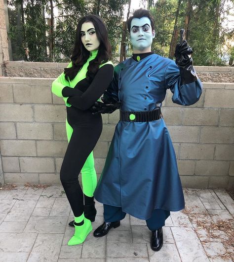 Safiya Nygaard on Instagram: “kim possible thinks she’s all that, but she’s NOT!! happy halloween to all the other villains out there 😈 what are u dressing up as…” Sheego And Drakken Costume, Shego Couple Costume, Sheego And Drakken, Dr Drakken Costume, Shego And Drakken, Shego Halloween Costume, Dr Drakken, Safiya Nygaard, Kim Possible Costume