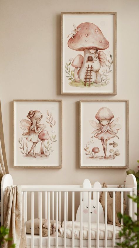 nursery with framed fairy and mushroom artwork above crib Fairytale Woodland Nursery, Baby Girl Fairy Nursery, Girl Woodland Theme Nursery, Whimsical Nursery Ideas, Fairy Garden Nursery Theme, Fairy Garden Nursery, Fairy Nursery Theme, Garden Nursery Theme, Delicate Artwork