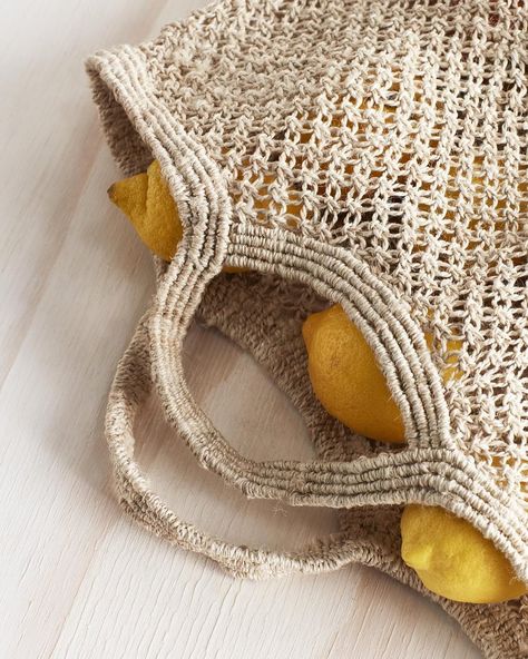 🍋 Our macrame bag is knotted entirely by hand and made from natural undyed jute. Perfect for all your fresh produce from the farmers market. #jute #jutebag #homedecor #homeaccessories #homegoods #northhomeware #interiordecor #interiordesign #homewares #photography Macrame Shopping Bag, Macrame Bag, Locally Grown, Jute Bags, Micro Macrame, Shopping Tote Bag, Fresh Produce, Perfect Bag, Shopping Tote