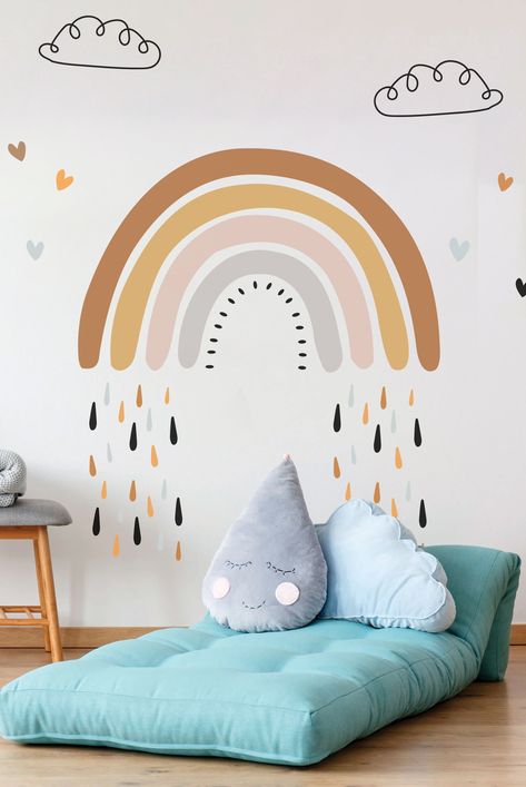 A rainbow wall sticker is a decorative adhesive decal that features a vibrant and colorful depiction of a rainbow. The rainbow wall sticker is made from high-quality vinyl material ensuring durability and easy application. The vibrant colors of the rainbow wall sticker can instantly add a cheerful and lively atmosphere to any room. It is a popular choice for any space where you want to create a joyful and colorful ambiance. Rainbow After Rain, Boho Rainbow Wall, Rainbow Decal, Nursery Wall Murals, After Rain, Neutral Boho, Wall Stickers Kids, Rainbow Wall, Boho Rainbow