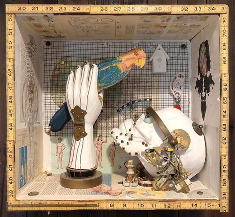 An homage to Joseph Cornell work titled; "A Parrot for Juan Gris" (1953). Which itself is an homage to Jaun Gris's artwork "The Man at the Café" (1914). Building upon the 2 other works I decided to bring a half man / half robot into the fold hinting that the next homage will be done by A.I. Joseph Cornell Artwork, Joseph Cornell Boxes, Cornell Box, Joseph Cornell, Half Man, The Fold, Natural Forms, Assemblage, Parrot