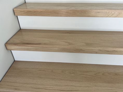 Red Oak Stairs, Wood Stair Treads, Stair Tread Covers, White Stairs, Oak Stairs, Cozy Basement, Thousand Dollars, Stair Tread, Wood Stairs