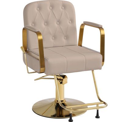 Elevate your salon experience with this sophisticated hydraulic modelling chair. Its elegantly upholstered and shimmering gold-coloured metal frame exudes timeless sophistication. Easily swivel and adjust the seat height with the hydraulics to provide optimal comfort during long styling sessions. A sturdy base with castors ensures smooth movement. Meticulously crafted to blend luxury with functionality, this chair offers an unrivalled pampering experience for your valued clients. With its striki Upscale Salon, Hair Chair, Chair Styling, Stylist Chair, Corporate Shirts, Layered Haircuts With Bangs, Reception Chair, Long Layered Haircuts, Salon Chairs