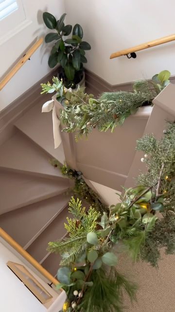 Stair Garland, Garland Staircase, Christmas Smells, Christmas Garland Staircase, Wood Banister, Christmas Garland On Stairs, Christmas Stairs, Christmas Staircase, Christmas Smell