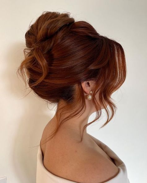 RACHEL JONES | Calgary Bridal Hair & Educator on Instagram: "Current Obsession : High Twist   And my hidden secret..  ✨ Hair Padding ✨  This is not a typical updo where you would “need” hair padding for volume  But I LOVE it for…  Longevity 🫶🏻  This is a very important word in the RJStyles Vocabulary because   Not only do I want you to look amazing when you leave the studio BUT for the next 10+ hours   The padding keeps the volume intact where teasing may not   Which not only provides height but width in your updo 🙌🏻  Ear rings: @joannabisleydesigns  Model/ hair color: @manesbymariah   #hightwist #updohairstyles #updotutorial #updospecialist #yycbride #yychair #schwarzkopf #schwarzkopfusa #calgarybusiness #calgarybride #albertabride #albertawedding  #2024hairtrends #2024bride   #btcone Soft High Bun Wedding Updo, Romantic Updo Medium Hair, Updo Volume On Top, Bridal Updo Red Hair, Copper Hair Updo, Soft French Twist Updo, Bridesmaid Hair High Updo, Piled High Updo, Bridal Hair High Updo