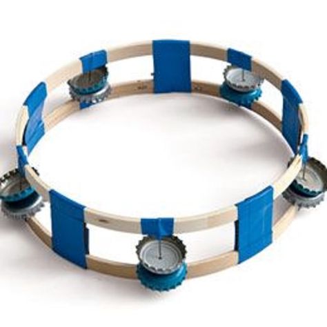 This homemade tambourine can be made with simple things at home which include soda bottle caps. As you shake the tambourine, the caps will strike each other making a great sound. Music Instruments Diy, Instrument Craft, Homemade Musical Instruments, Making Musical Instruments, Homemade Instruments, Diy Instruments, Girl Scout Juniors, Music Crafts, Girl Scout Ideas