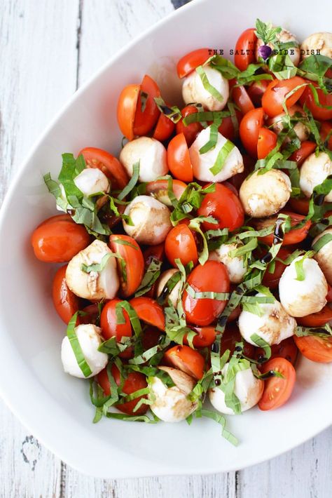 Caprese Salad is an easy recipe with cherry or grape tomatoes, balls of mozzarella and fresh basil all drizzled with a perfect balsamic dressing from @SaltySideDish Italian Caprese Salad, Caprese Bruschetta, Fresh Basil Recipes, Fresh Appetizers, Ensalada Caprese, Tomato Caprese, Carb Sides, Caprese Recipes, Mozzarella Balls